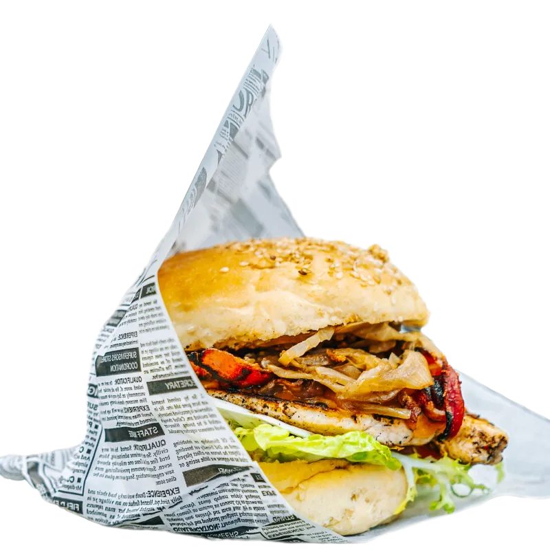 Foodliner Chicken Burger mit zart gegrilltem Hähnchenfilet, karamellisierten Zwiebeln, frischem Salat und Sesambrötchen – unwiderstehlicher Genuss für alle Burger-Fans.